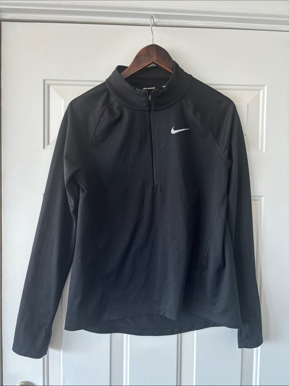 Nike Black Half-Zip Athletic Top with White Swoosh